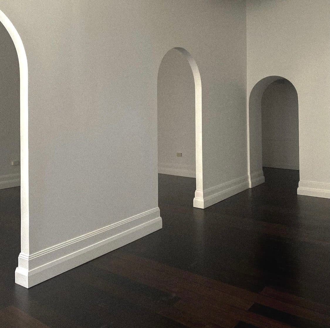 Arched openings running through the studio