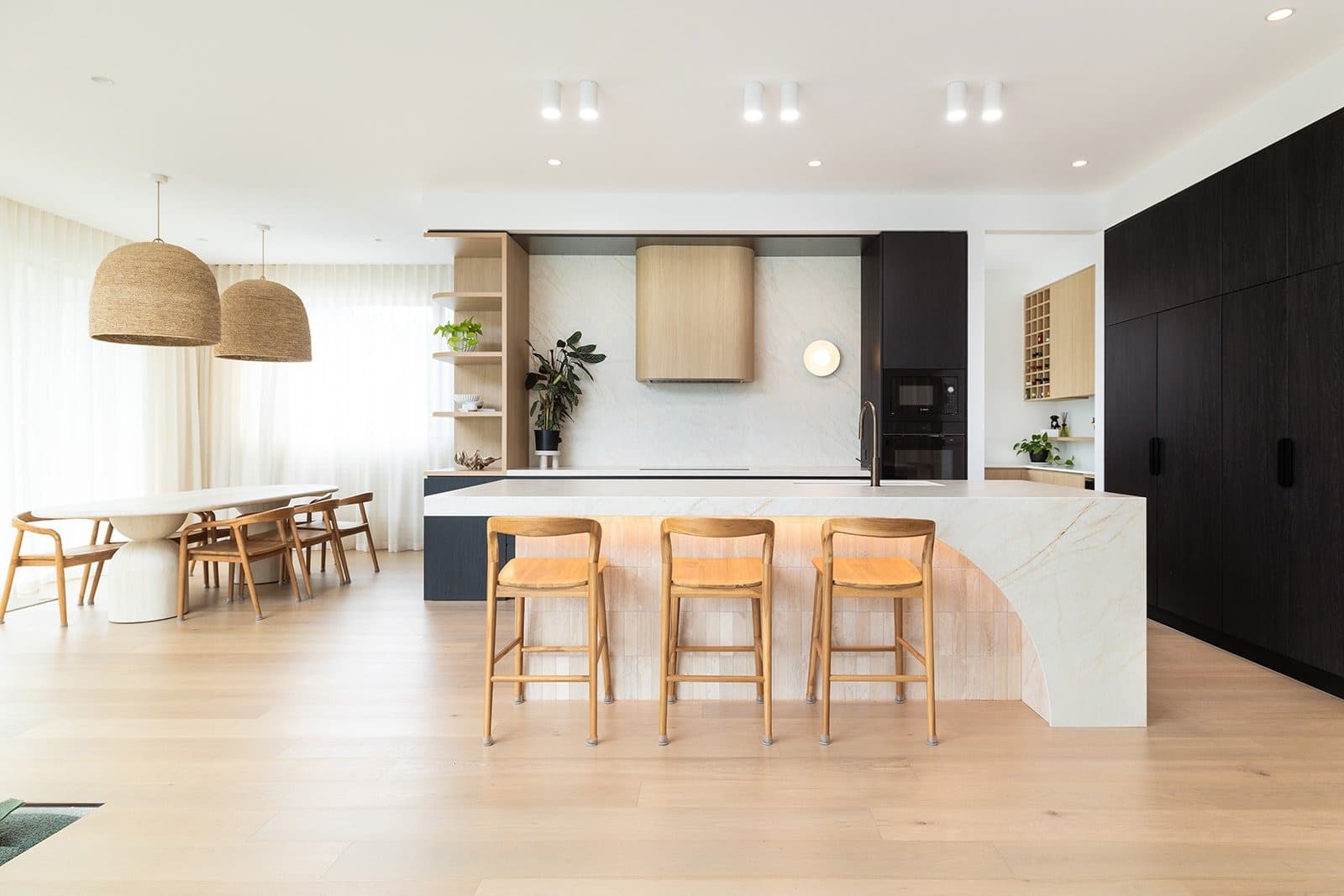 Completed kitchen in a whole-home renovation at Redhead by Michael Bell Construction
