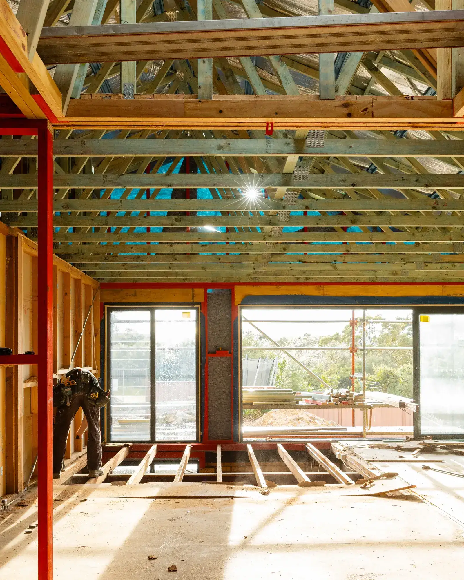 Timber frame at Dudley with roof trusses exposed and openings formed